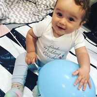 64331287_902254663459167_8903378131281248256_n Child with a balloon