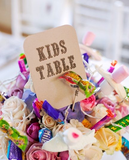 Kids-Weddings-kids-table- Sweets and flowers in a bouquet